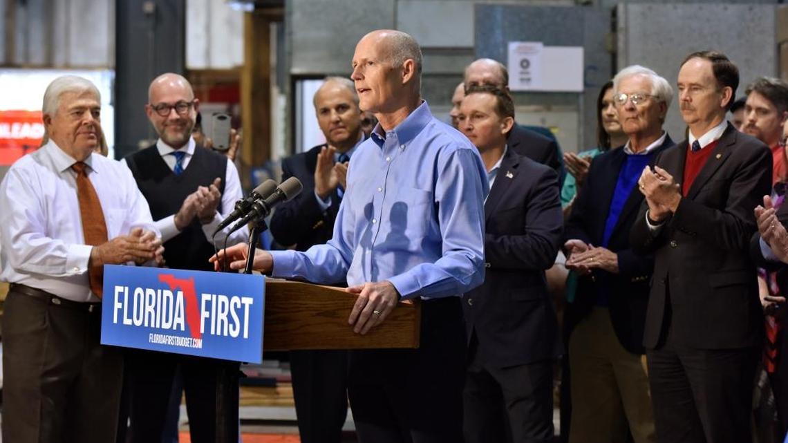 Gov. Rick Scott announces his state budget proposal, which would cut taxes by $1 billion and add $250 million for economic development incentives Monday, Nov. 23, 2015, at Harbinger Signs in Jacksonville.