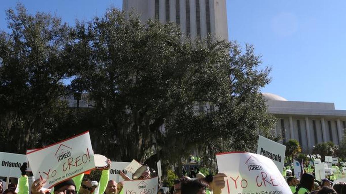 Demonstrators march on the Capitol as they rally in support of the school voucher program, Jan. 19, 2016, in Tallahassee. The rally was part of a marketing campaign by supporters of the program, who want the state’s largest teachers union to drop a lawsuit challenging it in court.