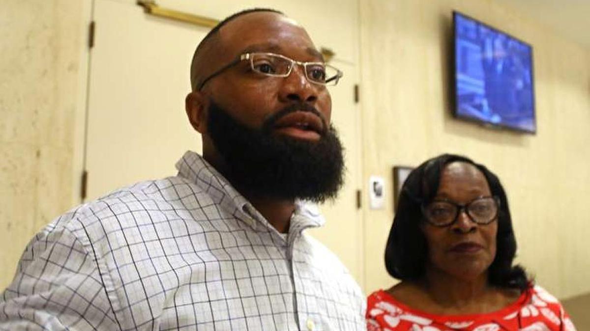 Dennis Hill, 39, of Groveland, with his mother, Barbara Gaines, received a pardon Thursday, March 8, 2018, from Gov. Rick Scott and the Cabinet in their quarterly meeting as the state clemency board.