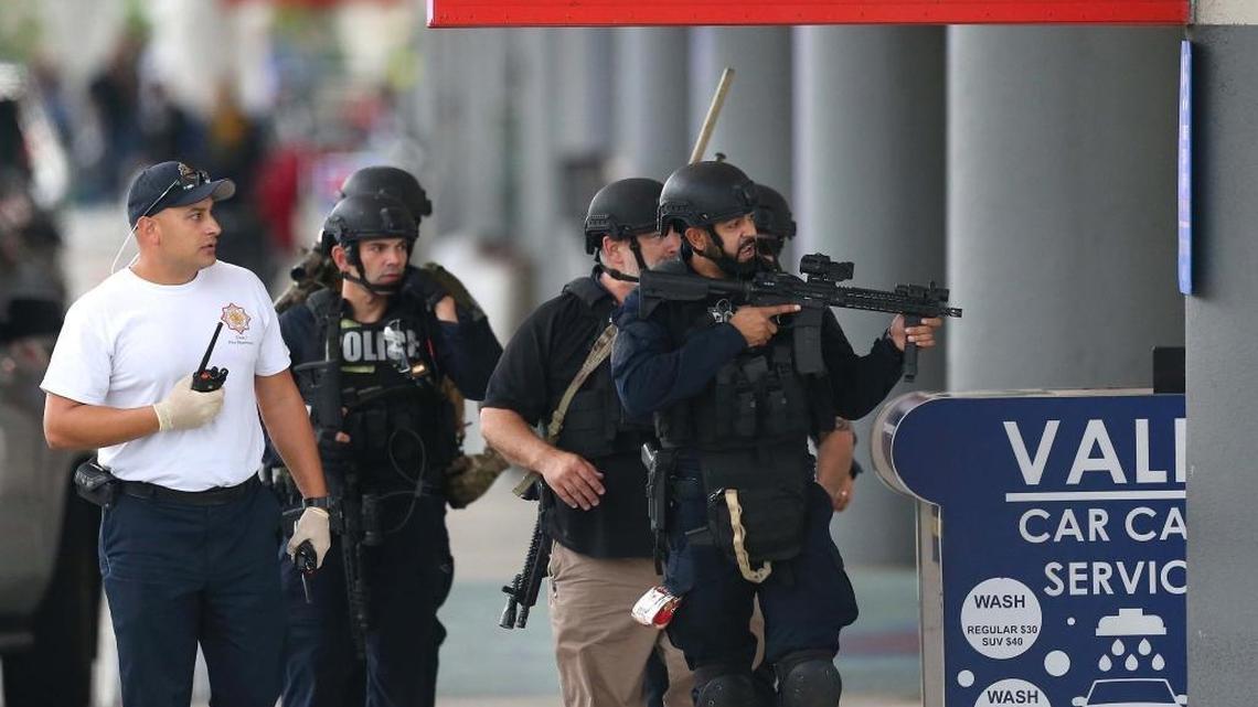 Police respond to the shooting at Fort Lauderdale-Hollywood International Airport on Friday, January 6, 2017.