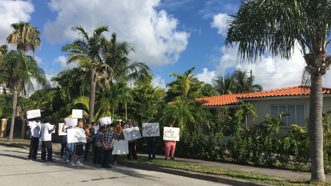Protesters demonstrated outside state Rep. Daisy Baez’s house Monday morning.
