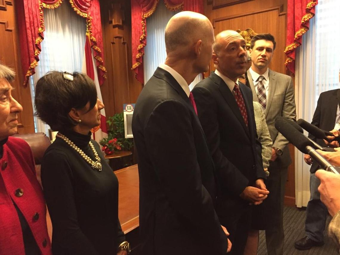 Gov. Rick Scott, center, appointed C. Alan Lawson, right, to the Supreme Court in December 2016. Lawson wrote the court’s majority opinion, released Thursday, in favor of Scott in a case where the governor's authority had been challenged after he reassigned death penalty cases away from an independently elected state attorney.