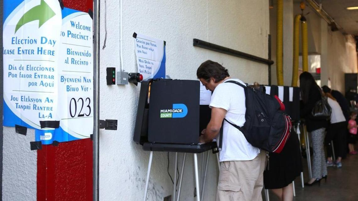 Voters cast their ballots at Miami Beach Fire Station #3 on Tuesday, November 8, 2016.
