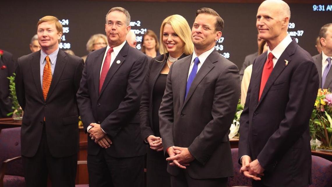 From left: Florida Agriculture Commissioner Adam Putnam, Chief Financial Officer Jeff Atwater and Attorney General Pam Bondi sit with Lieutenant Gov. Carlos Lopez Cantera and Gov. Rick Scott during the opening day of the 2017 legislative session on Tuesday, March 7.