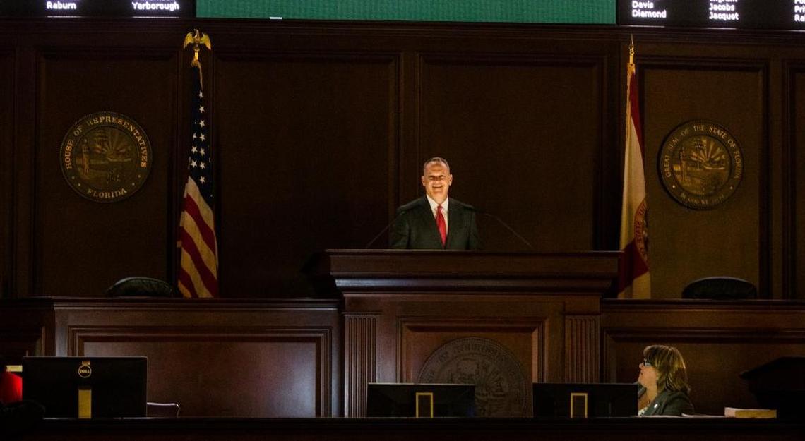 Speaker of the House Richard Corcoran, R-Land O’Lakes, addresses legislators in a darkened chamber to play a “thank you” video as the chamber waits on the final budget bill to arrive from the Senate Monday night, May 8, 2017, at the Florida Capitol in Tallahassee, Florida.
