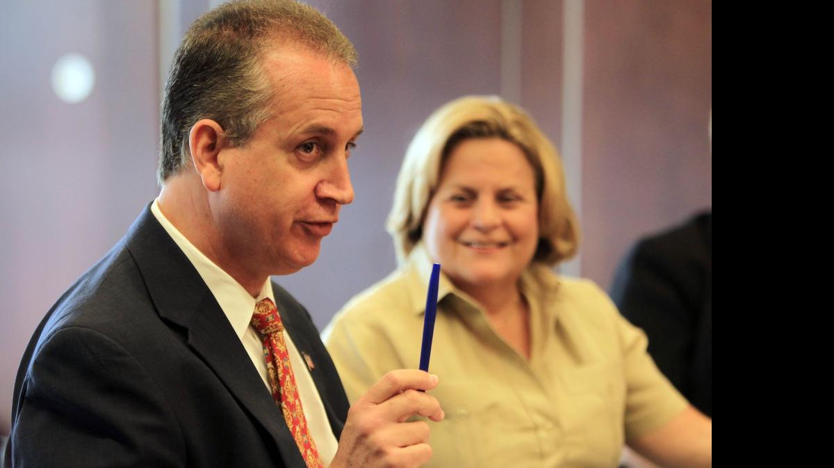 
U.S. Reps. Mario Diaz-Balart and Ileana Ros-Lehtinen, pictured here in Doral in 2013, are two of three Miami Republicans whose congressional districts must be redrawn.
