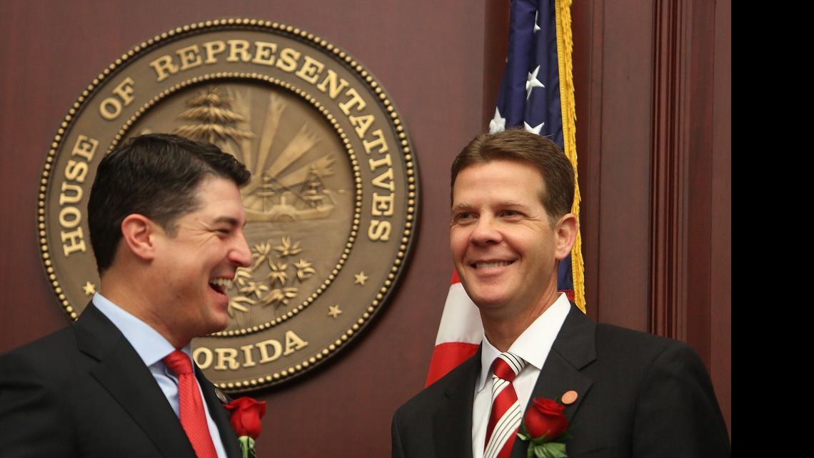 
Florida House Speaker Steve Crisafulli, R- Merritt Island, left, and Senate President Andy Gardiner, R- Orlando, share a laugh March 3, 2015 at the start of the 2015 Florida Legislative session in Tallahassee. They will convene a special session Aug. 10 to redraw the state map for congressional districts. 
