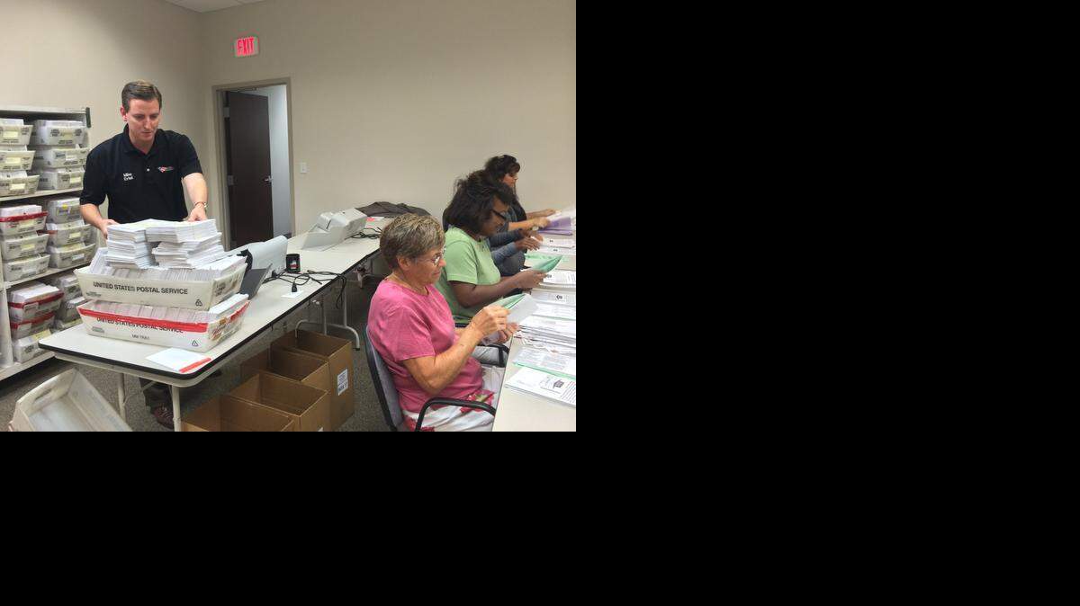 
Seminole County Elections Superviser Michael Ertel processes absentee ballots for this year’s election.

