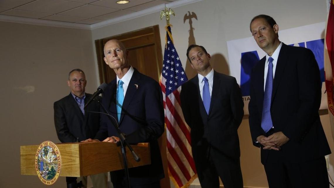 Florida Gov. Rick Scott, center, spoke Friday alongside House Speaker Richard Corcoran, far left, Lt. Gov. Carlos Lopez-Cantera and Senate President Joe Negron.