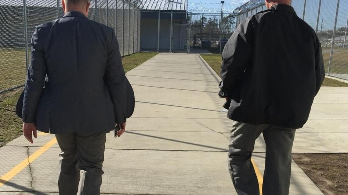 Rep. David Richardson, D-Miami Beach, walks with the former warden at Suwannee Correctional, Thomas Reid, during a tour of the facility that handles overflow in the state’s prison population of juvenile offenders.