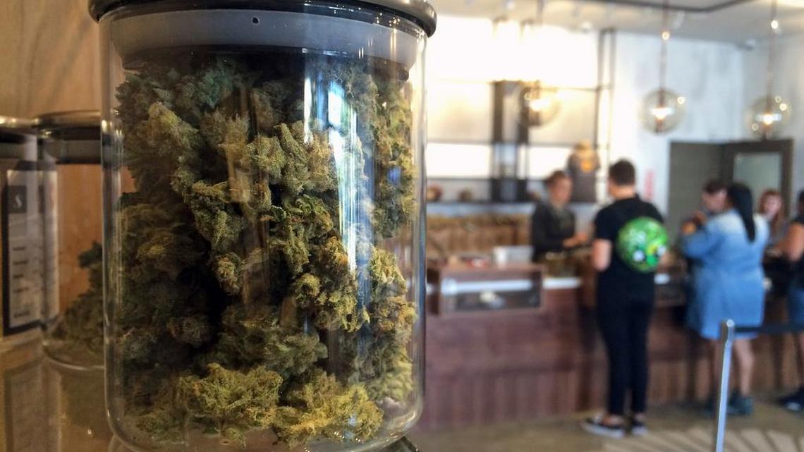 Customers buy products at the Harvest Medical Marijuana Dispensary in San Francisco in April.