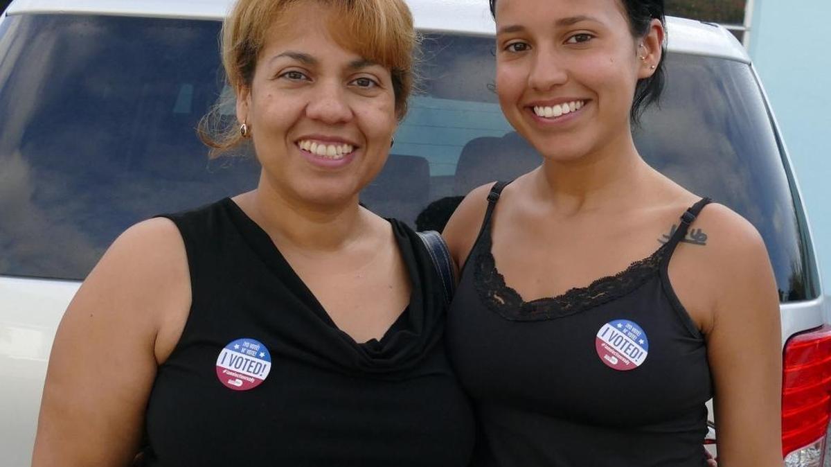 Maria Lozano 50, and Gabriella Genao 20, speak to the media after voting for Hillary Clinton in Florida’s presidential primary March 15.