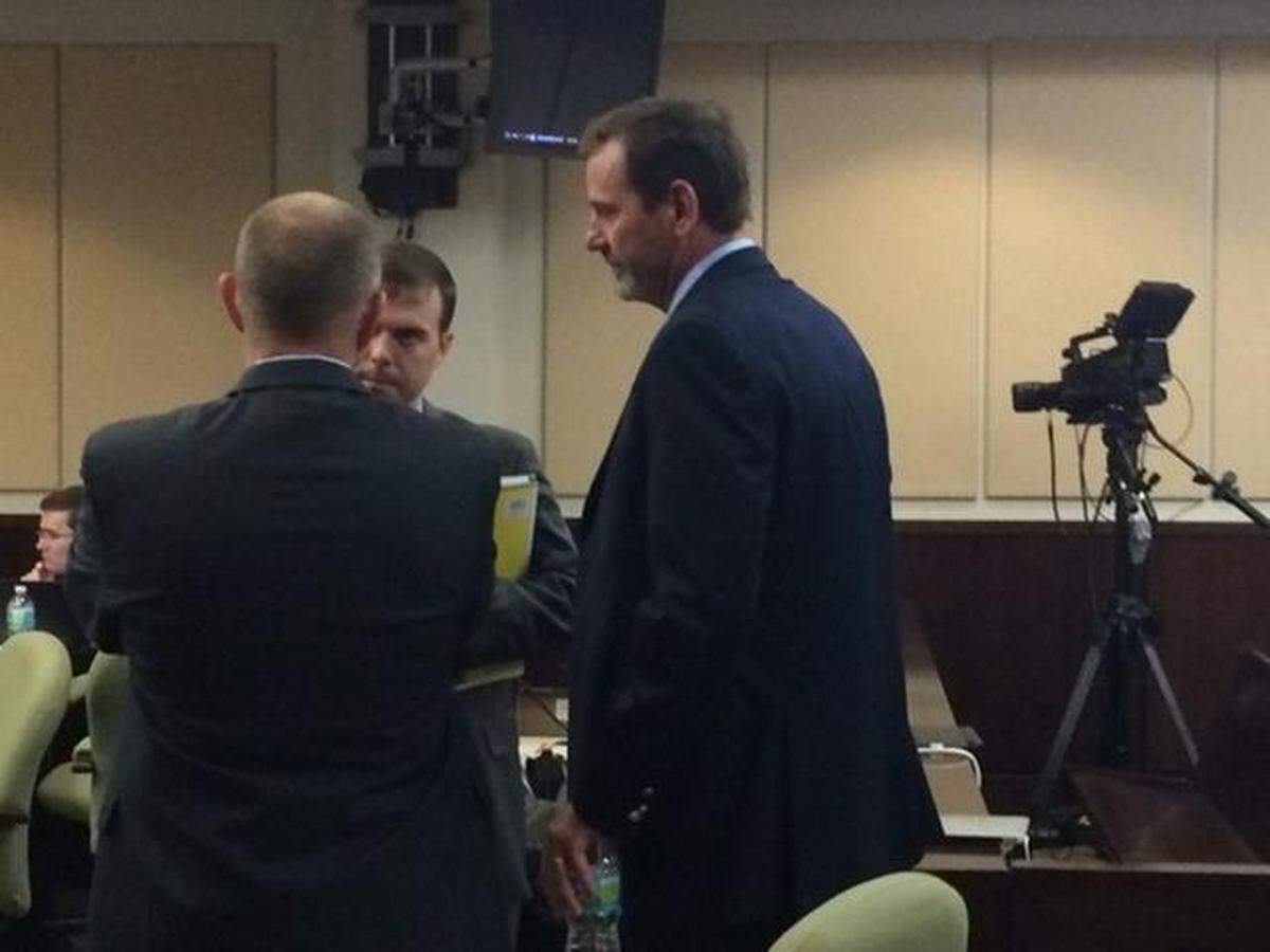 Political consultant Pat Bainter, right, consults with attorneys during the trial over the congressional redistrict maps. The courtroom was closed for his testimony over his emails.