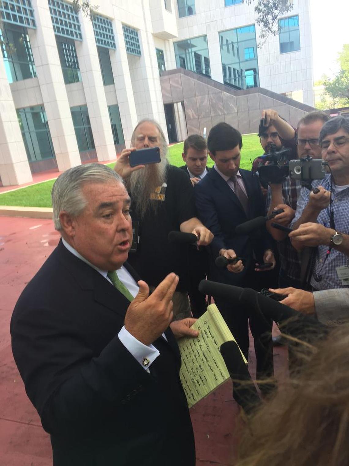 John Morgan speaks to reporters Thursday after filing a lawsuit challenging the state for banning smoking as a medical use of marijuana.