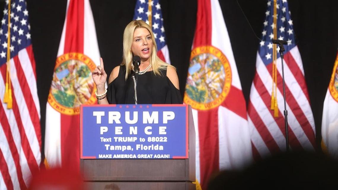 Florida Attorney General Pam Bondi speaks to Donald Trump supporters during a campaign rally at the Entertainment Hall at the Florida State Fairgrounds in Tampa, Wednesday, Aug. 24, 2016.