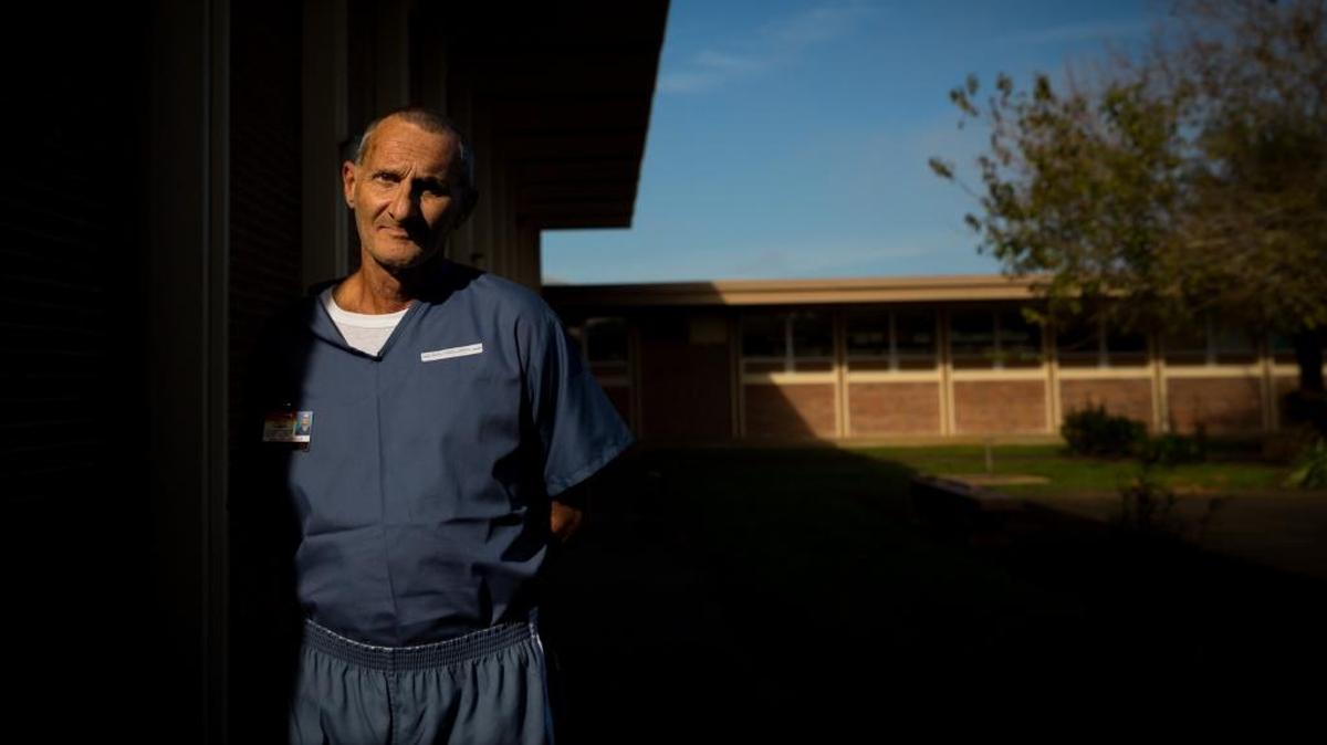 Orville Lee Wollard stands for a portrait inside Apalachee Correctional Institute East in Sneads, Fla., Nov. 12, 2015.