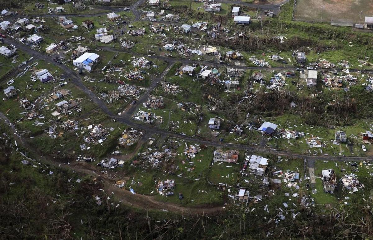 Homes and other buildings destroyed by Hurricane Maria lie in ruins in September in Toa Alta, Puerto Rico.