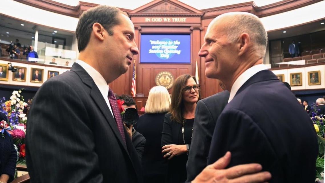 Senate President Joe Negron, R-Stuart, greets Florida Gov. Rick Scott as the Senate formally convened for the 2017 legislative session on Tuesday.
