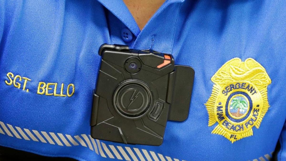 Miami Beach Police Sgt. Alex Bello, in charge of the department’s body camera program, wears a camera during a demonstration, May 5, 2015, in Miami Beach.