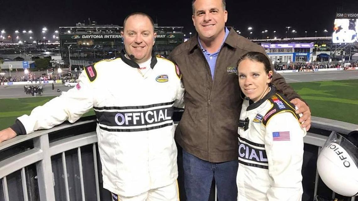 Sen. Frank Artiles, chairman of the Senate Communications, Energy and Public Utilities Committee, poses with two race officials at Daytona Beach International Speedway on Feb. 24. NextEra sponsored the Friday night truck race. Artiles put on the sponsor’s jacket and waved the green flag. ‘It was cool,’ he said.