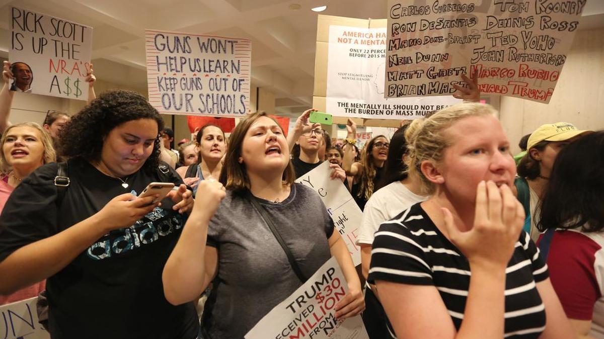 Protesters moved an outdoor rally inside the Florida Capitol Wednesday afternoon, Feb. 21, 2018, demanding to speak to Legislative leaders.