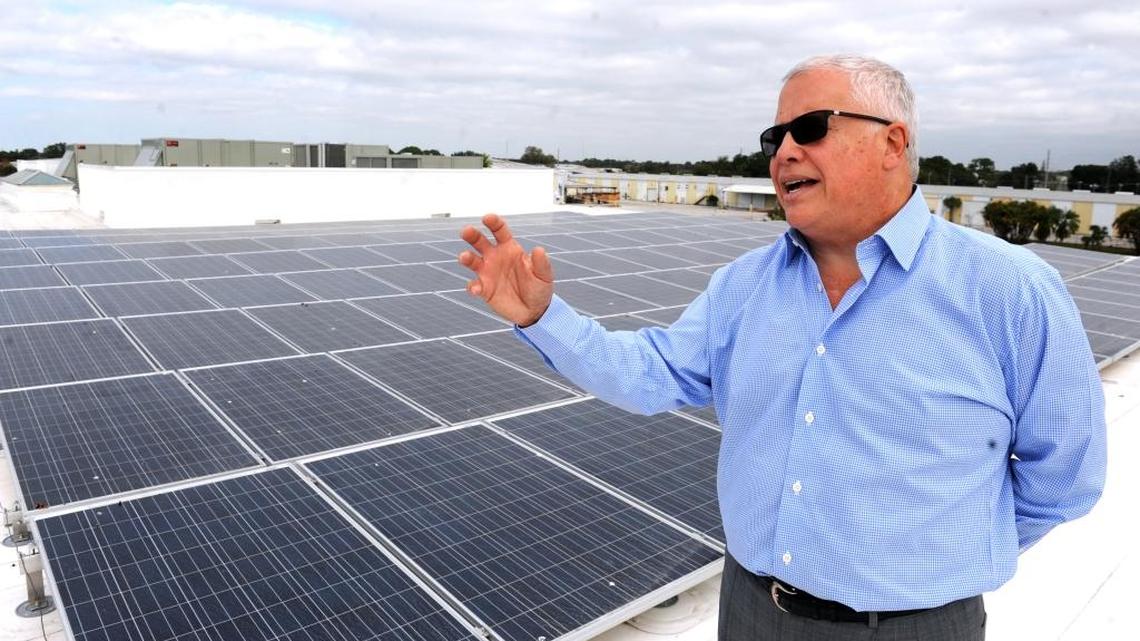 Carlos Beruff, president of Medallion Home, stands on the roof where arrays of solar panels are used to provide energy for the new headquarters for his company, in this Dec. 2014 file photograph. Beruff is entering the race for Marco Rubio’s U.S. Senate seat.