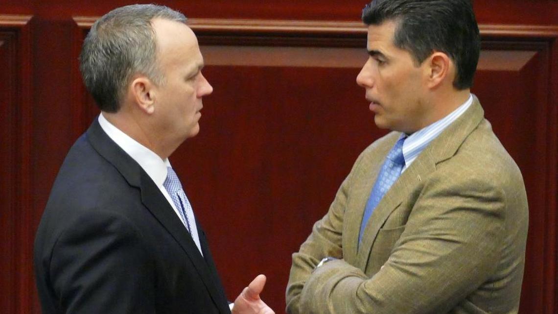 Rep. Richard Corcoran, R-Land O’Lakes, talks with Rep. Jose Oliva, R-Miami Lakes, March 9, 2016, during debate on the Florida House floor.