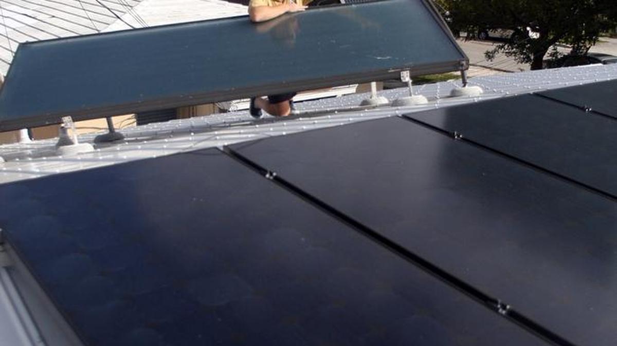 This home in Miami’s Roads neighborhood has rooftop solar panels.
