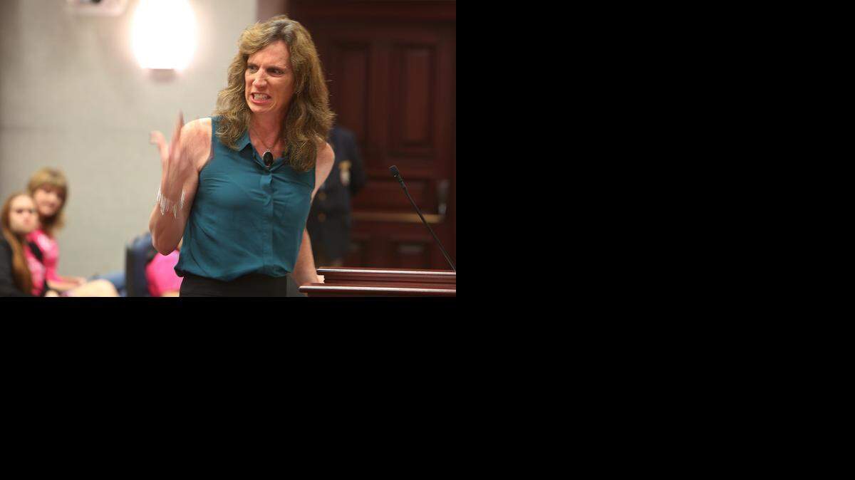 
Cindy Sullivan, 45, St. Petersburg, a transgender woman, responds to Rep. Frank Artiles, R- Miami, sponsor of HB 583 during a House Civil Justice Subcommittee meeting, Wednesday at the Capitol in Tallahassee. Sullivan spoke against the bill that Requires that use of single-sex facilities be restricted to persons of sex for which facility is designated; prohibits knowingly & willfully entering single-sex public facility designated for or restricted to persons of other biological sex; provides exemptions; provides private cause of action against violators; provides for preemption. "I just want live an authentic life free from harassment. Harassment is out there in the community and this bad bill is government harassment," said Sullivan.
