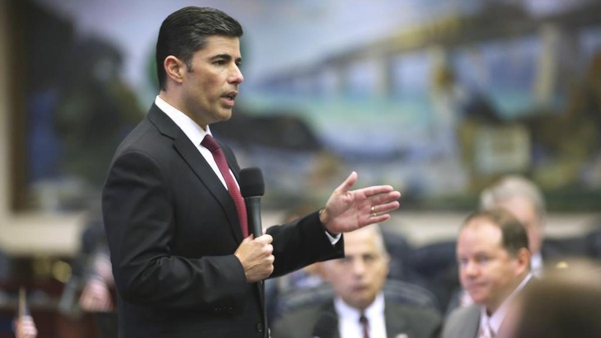 Rep. Jose Oliva, R-Miami Lakes, answers questions on a guns and school safety bill on the floor of the House, at the Capitol in Tallahassee, Tuesday, March 6, 2018.