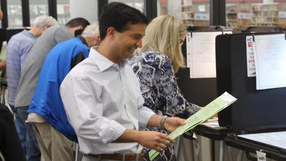 
Miami congressional candidate Carlos Curbelo voted Tuesday at the West Dade Regional Library early-voting site.
