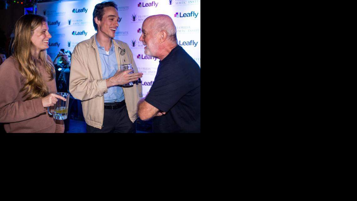 
AT A LOSS: Amendment 2 proponents, from left, Zoe Amerigan, Dave Diedrich and Ron Lockhart await the results at an election watch party on Tuesday at Gramps in Miami.
