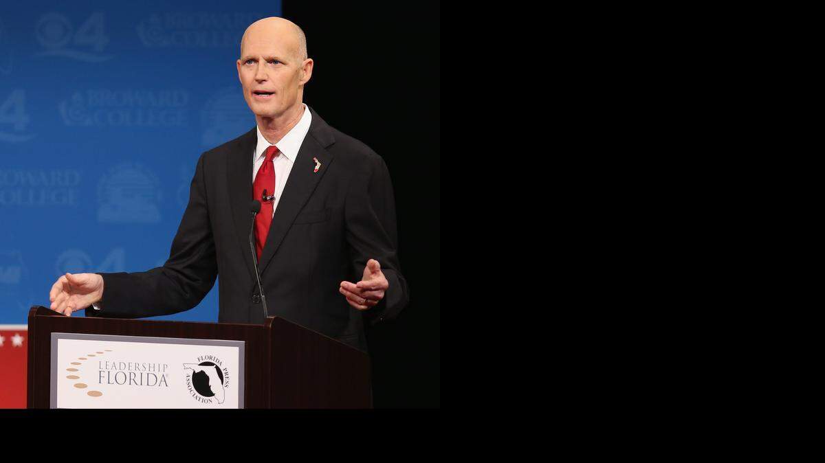 
Florida Gov. Rick Scott speaks during a televised debate with former Florida Governor and Democratic candidate Charlie Crist at Broward College on October 15, 2014 in Davie. 
