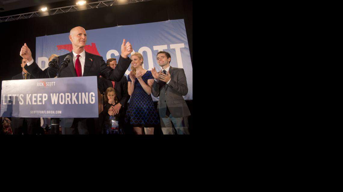 
Florida Gov. Rick Scott gives two thumbs up before making a victory speech after defeating Democratic challenger, former Gov. Charlie Crist on Tuesday, Nov. 4, 2014 in Bonita Springs, Fla. 
