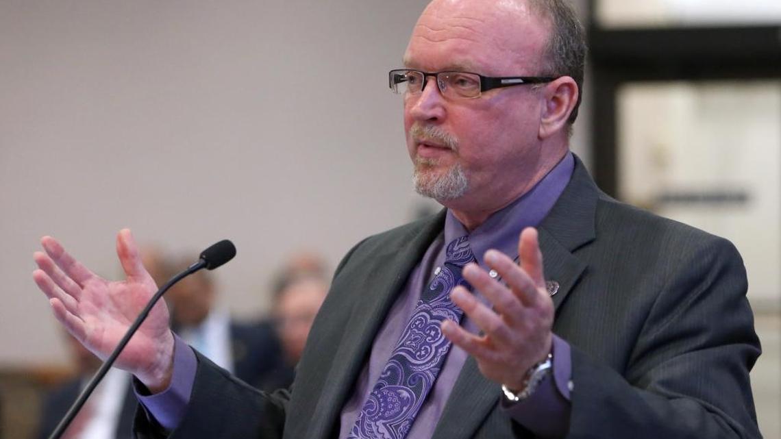 Insurance Commissioner Kevin McCarty delivers a report to the Cabinet during a meeting, Tuesday, April 26, 2016, in Tallahassee.