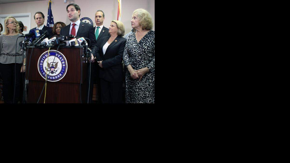 INCENSED:  From left, former U.S. Rep. Lincoln Díaz-Balart, Cuban dissident Iris Tamara Pérez, Sen. Marco Rubio, and U.S. Reps. Mario Díaz-Balart and Ileana Ros-Lehtinen address reporters during a press conference in Miami on Thursday. They were joined by relatives of the four Brothers to the Rescue activists who were killed when the Cuban military shot down their planes in 1996.