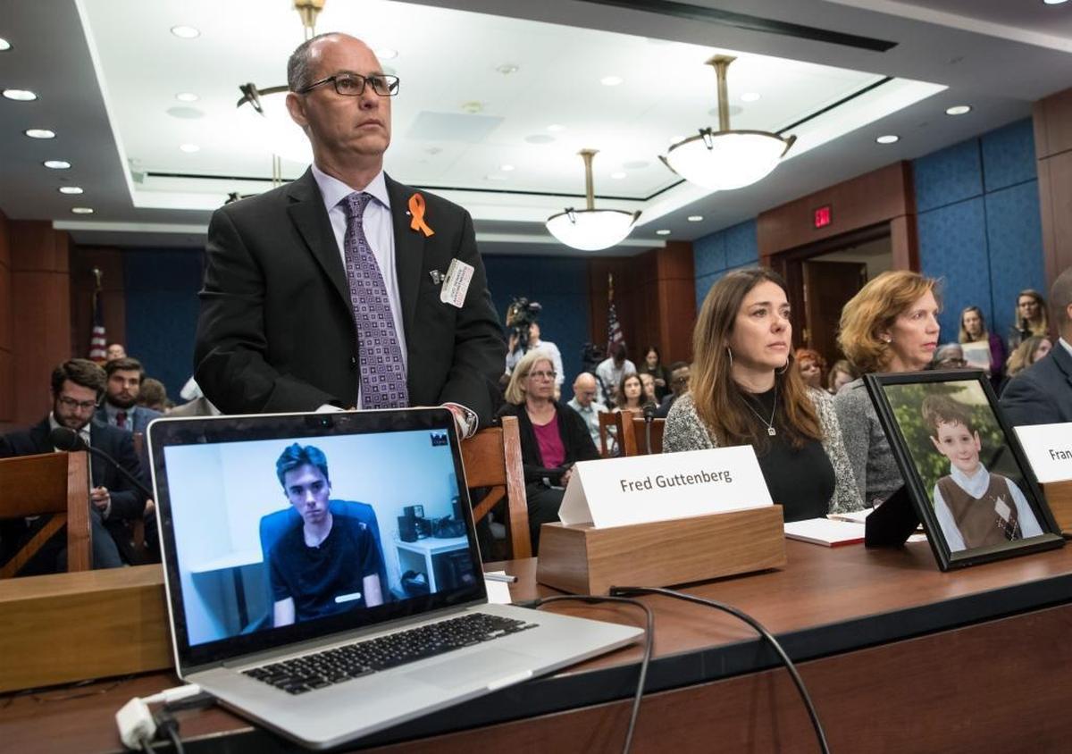 From left: On the laptop screen, David Hogg, 17-year-old student from Marjory Stoneman Douglas High School in Parkland; Fred Guttenberg, father of Jaime Guttenberg, 14, who was killed in the shootings; Francine Wheeler, mother of Ben Wheeler, who was killed in the 2013 Sandy Hook shooting; and Lori Haas, whose daughter Emily survived the 2007 Virginia Tech shooting. All joined a panel at an event in March at the Capitol in Washington sponsored by Senate Democrats on protecting children from gun violence.