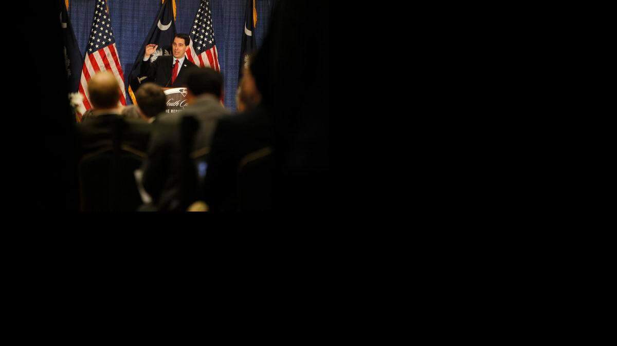 Making the rounds:  Scott Walker speaks during a luncheon in Columbia, S.C.