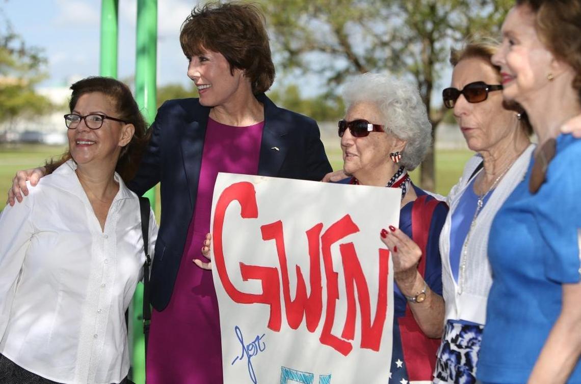 Former U.S. Rep. Gwen Graham stands with supporters for a photo after she announced that she is running for governor Tuesday at a park in Miami Gardens.
