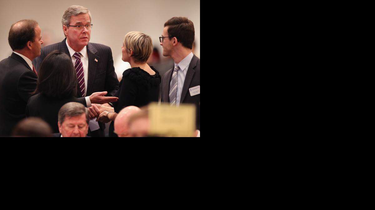 
DEMANDING LOYALTY: Behind the scenes, Jeb Bush and his aides have pursued the nation’s top campaign donors, political operatives and policy experts with a relentlessness and, in the eyes of rivals, ruthlessness that can seem discordant with his upbeat tone.
