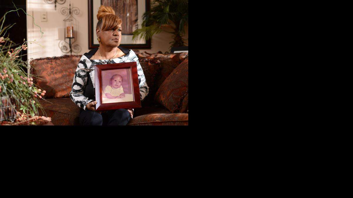 
Carolyn Dawson, 63, holds a photo of her son, Shurick Lewis, that was taken in 1974 when he was a month old. Her son has spent the last 24 years in prison on drug charges. Dawson was recently informed that her son was allegedly beaten by three corrections officers but she has not been allowed to see or contact him.
