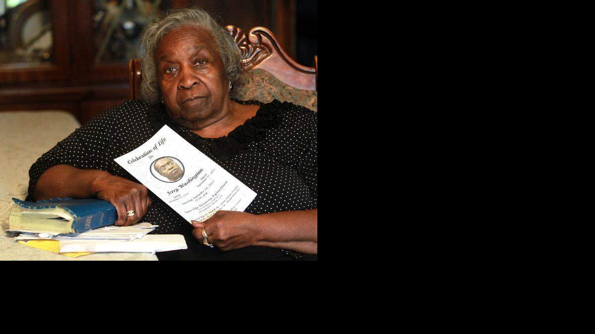 
Earlene Washington reads letters her son Jerry Washington wrote while he was in prison. Jerry was found dead Sept. 17, 2013, at Santa Rosa Correctional Institute near Milton, Fla. 
