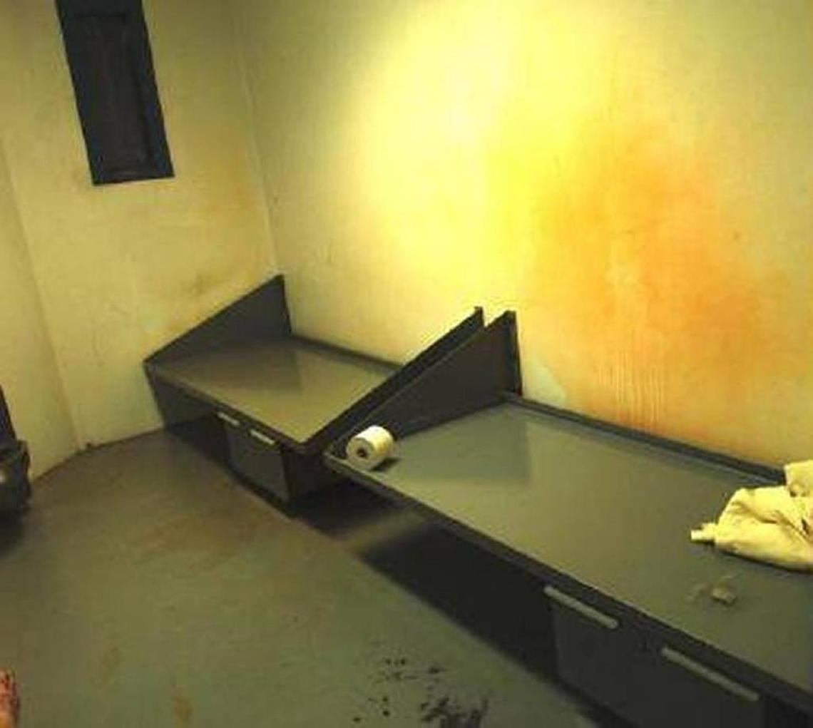 An eerie orange cloud, residue from the chemicals that corrections officers applied, was visible on the wall of the cell where Randall Jordan-Aparo was isolated. Jordan-Aparo, a man imprisoned for credit card fraud and drug charges, died while gasping for breath