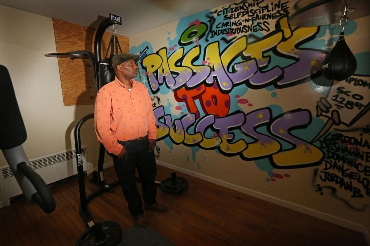 Edwidge Michel oversees five juvenile offenders who live in a three-story home in a working-class neighborhood in southwestern Queens. The group home is operated by SCO Family of Services. The program allows youthful offenders to serve their sentences while remaining close to their families and community.
