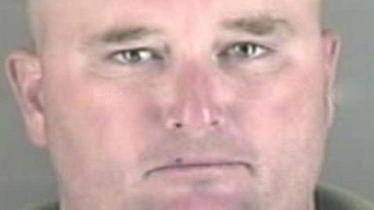 
Corrections officer Rollin Austin after being busted for driving under the influence in 2006. He was previously arrested for theft in 2002.
