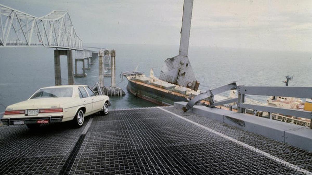 
A car is halted at the edge of the Sunshine Skyway Bridge across Tampa Bay after the freighter Summit Venture struck the bridge during a thunderstorm and tore away a large part of the span, May 1980. At least 31 persons were killed, 23 of them aboard a bus that toppled into the water.