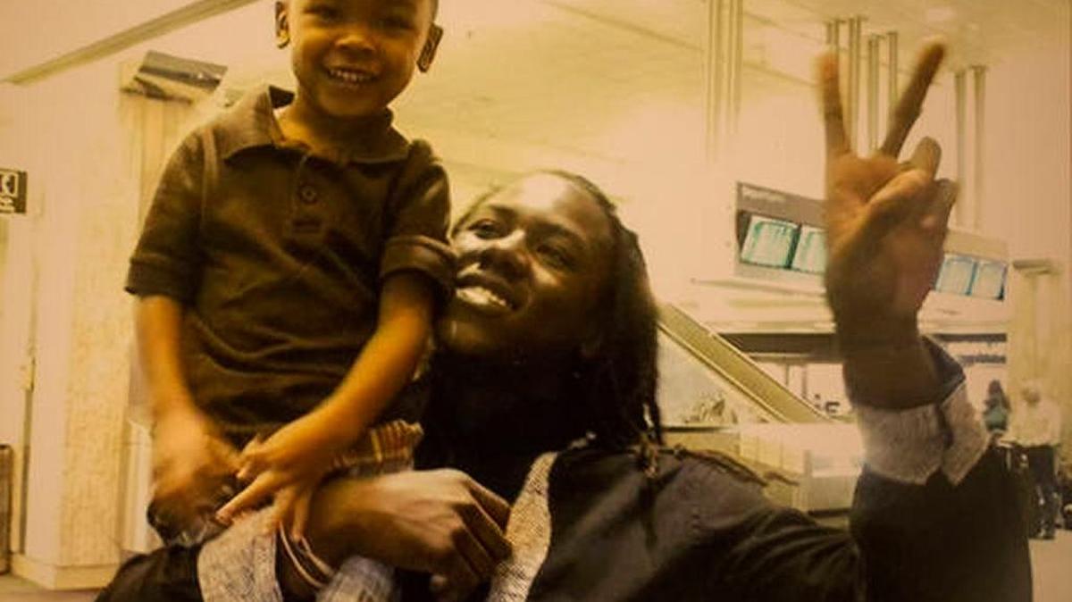 Rodney Mitchell poses with his son, Channing, the year before Mitchell was killed. Rodney Mitchell and his son Channing, 4, in 2011.