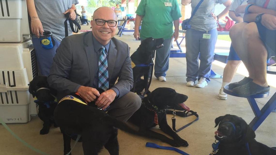 Earlier this year, Rep. David Richardson of Miami Beach visits a K-9 training program at Gadsden Correctional Institution, a women’s prison in North Florida. Inmates are in the background.
