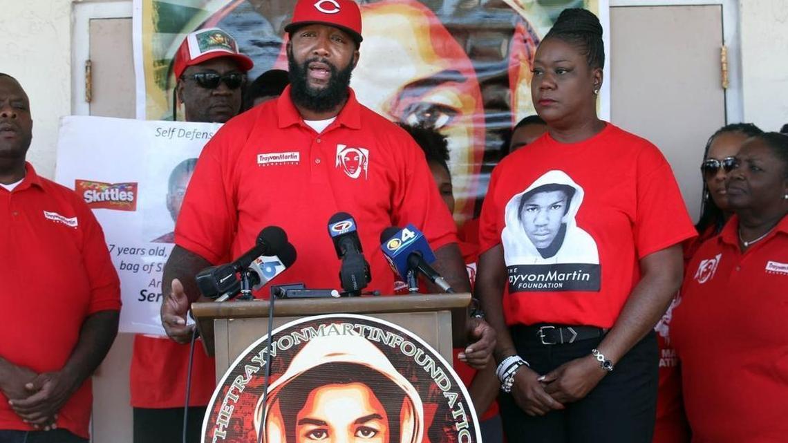Tracy Martin and Sybrina Fulton, mother and father of Trayvon Martin, meet with reporters in 2015.
