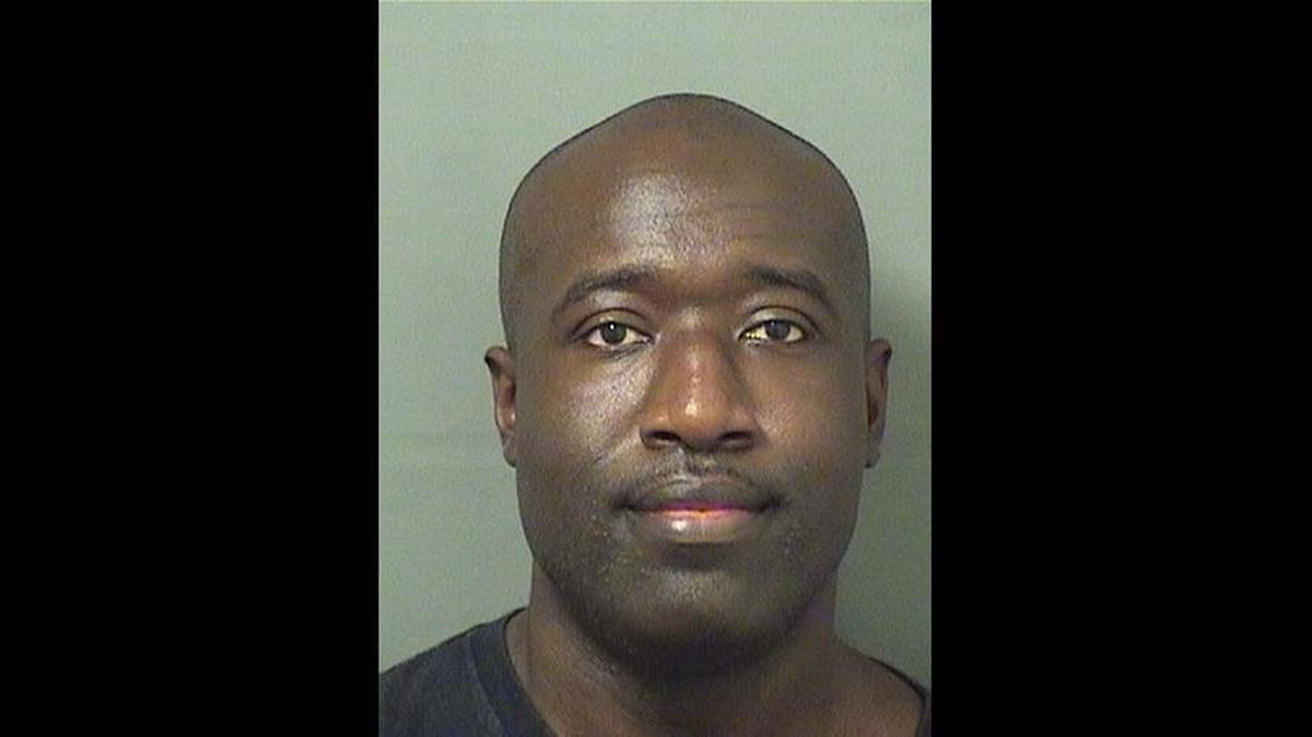 Kenneth Gray, a former West Palm Beach firefighter, is accused of committing arson by starting a fire inside a Walmart.